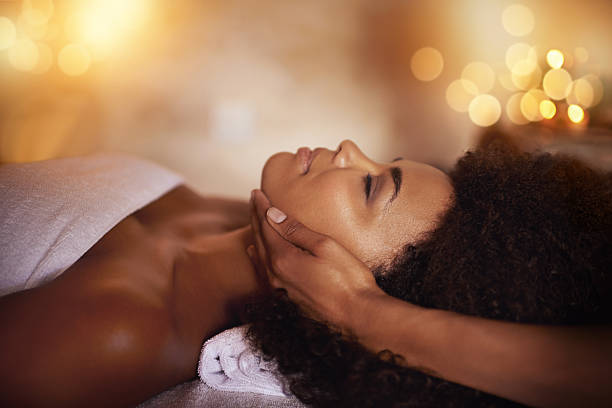 Shot of a young woman getting a head massage at a beauty spahttp://195.154.178.81/DATA/i_collage/pi/shoots/783696.jpg